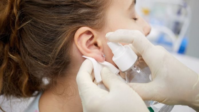 Using Showerhead to Remove Ear Wax